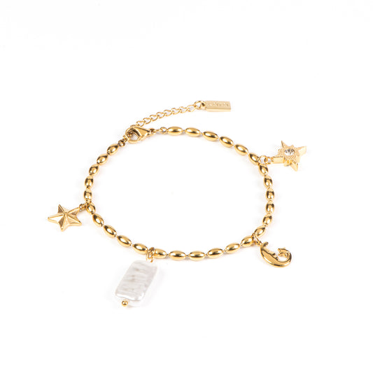 Bracelet vintage chic acier inoxydable or avec perle baroque et breloques étoile, lune, boussole - Juliana 1